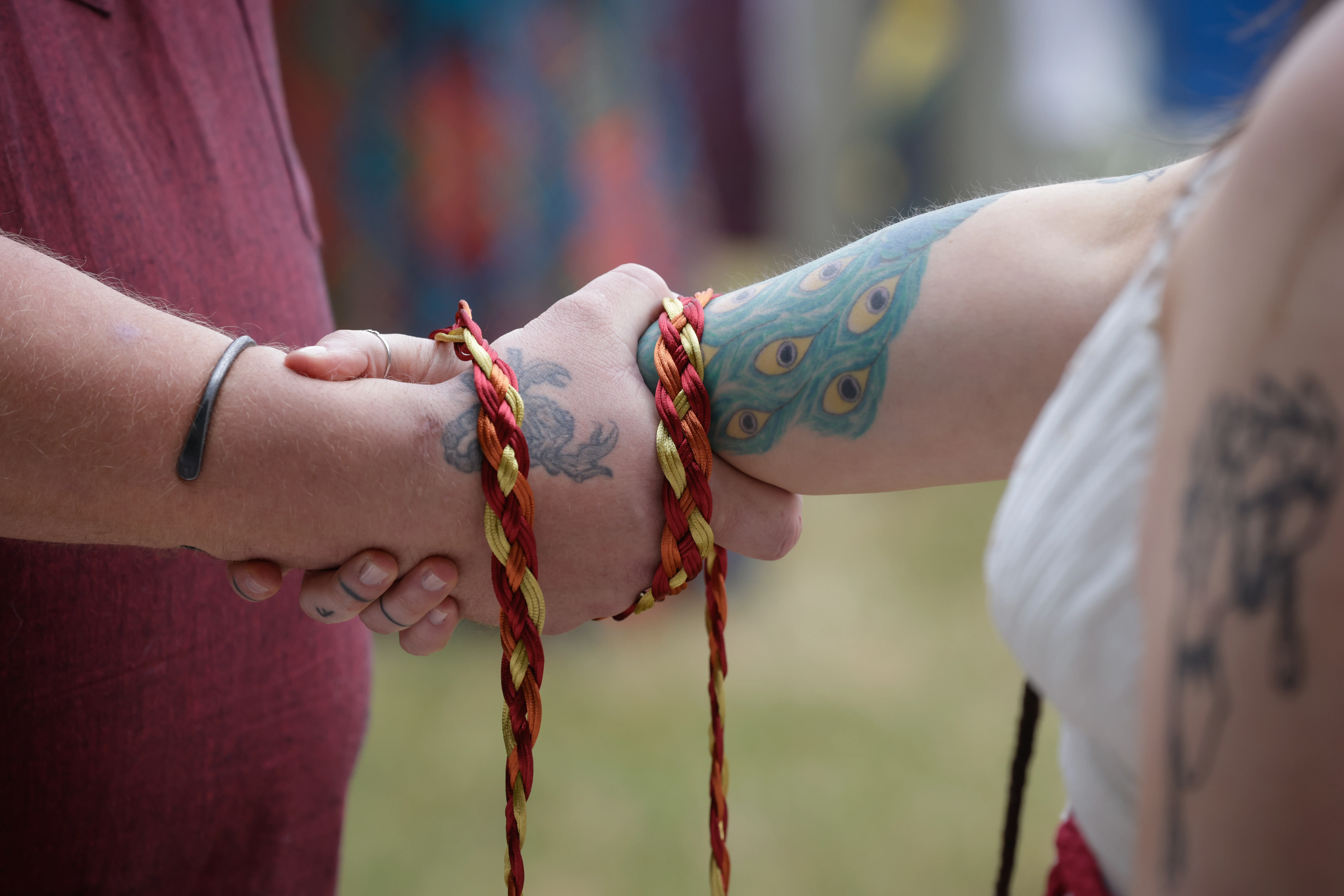 Handfasting ceremony with coloured braided cords