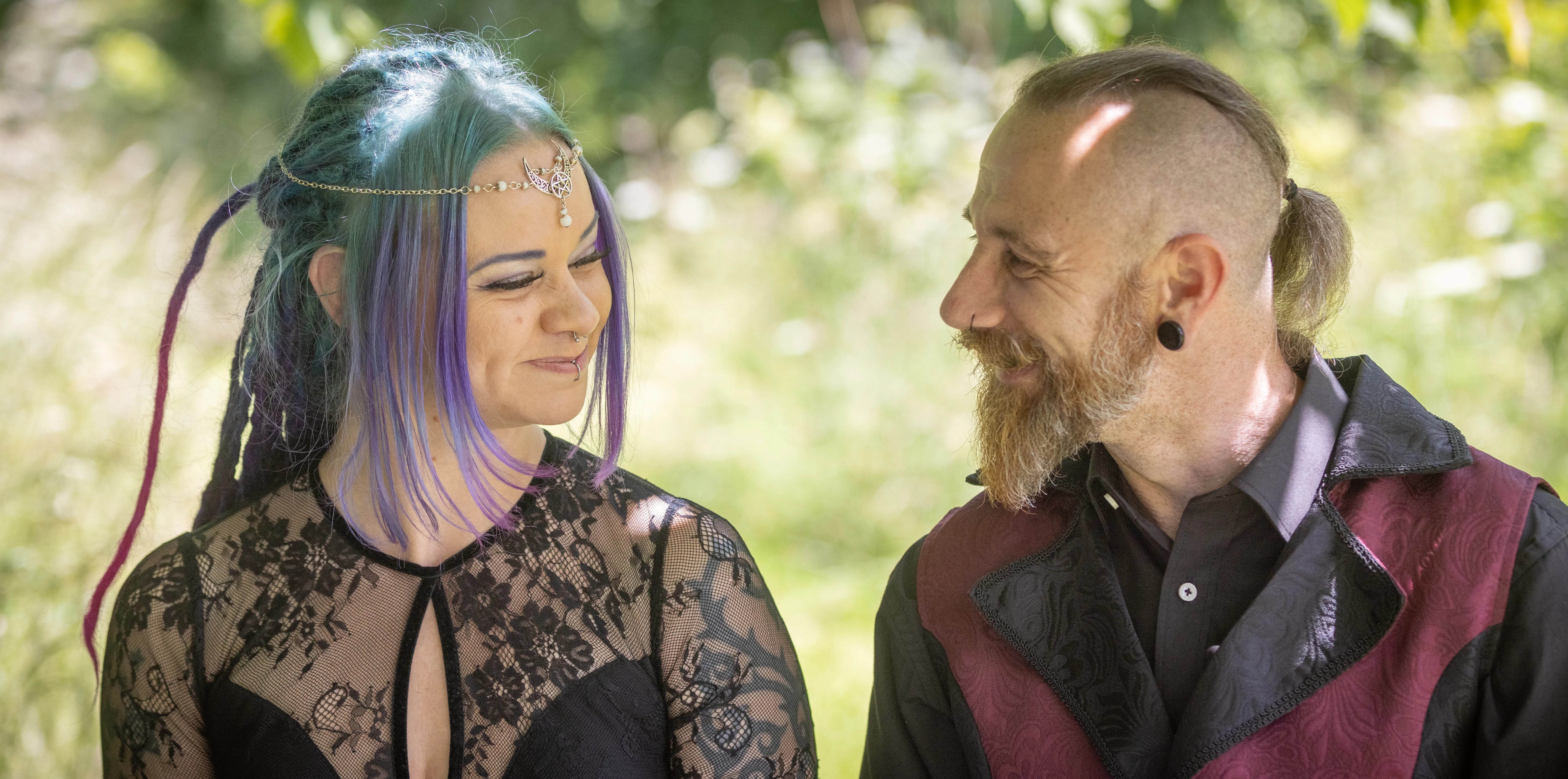 Bride laughing with her partner during their wedding